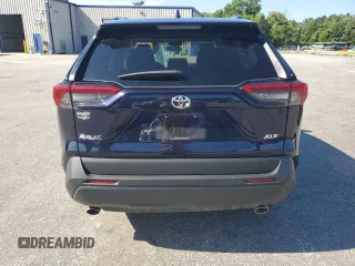 2019 Toyota RAV4 XLE with VIN 2T3W1RFV7KW029959, listed as a Copart auction lot 61825405 with 36,180 mi miles and Salvage title. Bid and sale history available at DreamBid. Image 6.