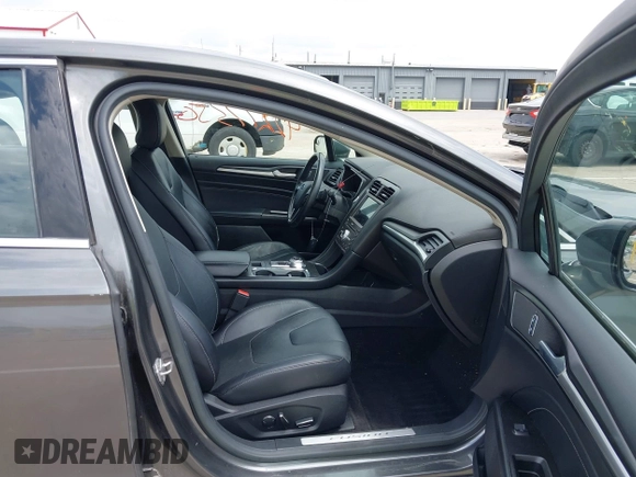 2017 Ford Fusion Titanium with VIN 3FA6P0D93HR261526, listed as a IAAI auction lot 42277350 with 117,388 mi miles and . Bid and sale history available at DreamBid. Image 5.