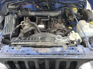 1998 Jeep Wrangler Sport with VIN 1J4FY19S5WP707201, listed as a Copart auction lot 86632884 with 0 mi miles and Salvage Title. Bid and sale history available at carsss.com. Image 13.
