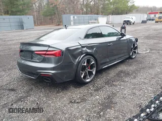 2023 Audi RS 5 z VIN WUANWAF55PA902356, wystawiony jako IAAI lot #41034121 z przebiegiem 3 717 mil mil oraz . Historia ofert i sprzedaży dostępna na DreamBid. Obrazek 4.