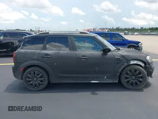 2018 MINI Countryman Cooper S z VIN WMZYT3C35J3E00804, wystawiony jako IAAI lot #42194381 z przebiegiem 101 634 mil mil oraz . Historia ofert i sprzedaży dostępna na DreamBid. Obrazek 13.
