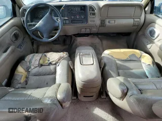 1997 GMC Suburban z VIN 3GKGK26J0VG522963, wystawiony jako Copart lot #56804105 z przebiegiem 297 544 mil mil oraz Tytuł czysty. Historia ofert i sprzedaży dostępna na DreamBid. Obrazek 8.