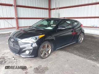 2013 Hyundai Veloster Turbo with VIN KMHTC6AE0DU179068, listed as a IAAI auction lot 42532883 with 182,916 mi miles and . Bid and sale history available at DreamBid. Image 2.