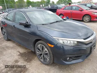 2018 Honda Civic EX-T z VIN 19XFC1F35JE201765, wystawiony jako IAAI lot #42315514 z przebiegiem 95 601 mil mil oraz . Historia ofert i sprzedaży dostępna na DreamBid. Obrazek 1.