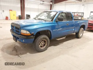 2000 Dodge Dakota Sport with VIN 1B7GG22N3YS639309, listed as a IAAI auction lot 41771758 with 225,795 mi miles and . Bid and sale history available at carsss.com. Image 2.