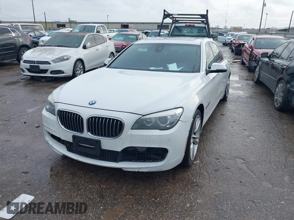 2015 BMW 7 Series 740Li with VIN WBAYE4C54FD947205, listed as a IAAI auction lot 41566291 with 172,729 mi miles and . Bid and sale history available at DreamBid. Image 17.