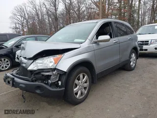 2007 Honda CR-V EX-L with VIN 5J6RE48757L017428, listed as a IAAI auction lot 41784403 with 131,388 mi miles. Bid and sale history available at carsss.com. Image 2.