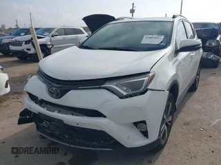 2018 Toyota RAV4 XLE z VIN 2T3WFREV2JW501356, wystawiony jako IAAI lot #42087027 z przebiegiem 32 117 mil mil oraz . Historia ofert i sprzedaży dostępna na DreamBid. Obrazek 17.