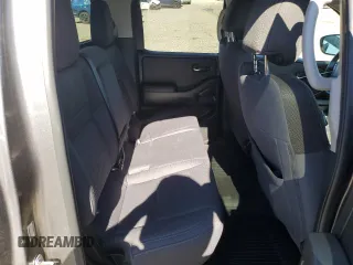 2024 Nissan Frontier SV z VIN 1N6ED1FK2RN604834, wystawiony jako Copart lot #76751104 z przebiegiem 7 788 mil mil oraz Szkoda całkowita • Salvage title. Historia ofert i sprzedaży dostępna na DreamBid. Obrazek 10.