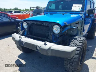 2016 Jeep Wrangler Unlimited Sport with VIN 1C4BJWDG2GL296485, listed as a IAAI auction lot 42177026 with 113,971 mi miles and . Bid and sale history available at DreamBid. Image 6.
