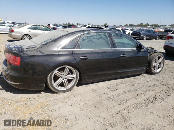 2013 Audi A8 3.0L with VIN WAURGAFD9DN004556, listed as a Copart auction lot 65018975 with 138,090 mi miles and Salvage title. Bid and sale history available at DreamBid. Image 3.