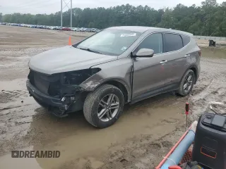 2017 Hyundai Santa Fe 2.4L z VIN 5NMZT3LBXHH038022, wystawiony jako Copart lot #51060545 z przebiegiem 63 790 mil mil oraz Szkoda całkowita • Salvage title. Historia ofert i sprzedaży dostępna na DreamBid. Obrazek 1.