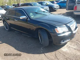 2014 Chrysler 300 C with VIN 2C3CCAKG5EH179583, listed as a IAAI auction lot 42001109 with 148,288 mi miles and . Bid and sale history available at carsss.com. Image 1.