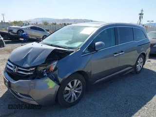 2014 Honda Odyssey EX-L with VIN 5FNRL5H67EB096027, listed as a IAAI auction lot 41950398 with 147,158 mi miles and . Bid and sale history available at DreamBid. Image 17.