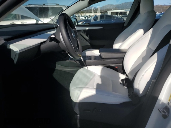 2024 Tesla Model Y Long Range with VIN 7SAYGDEE6RA261884, listed as a Copart auction lot 47639025 with 23,377 mi miles and Salvage Title. Bid and sale history available at DreamBid. Image 7.