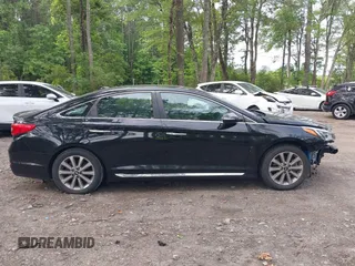 2017 Hyundai Sonata Sport z VIN 5NPE34AF2HH556347, wystawiony jako IAAI lot #42346721 z przebiegiem 94 845 mil mil oraz . Historia ofert i sprzedaży dostępna na DreamBid. Obrazek 14.