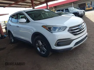 2018 Hyundai Santa Fe 2.4L z VIN 5XYZTDLB4JG539865, wystawiony jako IAAI lot #42160249 z przebiegiem 94 883 mil mil oraz . Historia ofert i sprzedaży dostępna na DreamBid. Obrazek 1.