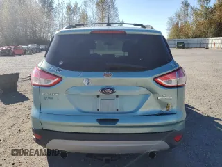 2013 Ford Escape SE with VIN 1FMCU0GXXDUA90806, listed as a Copart auction lot 72814224 with 136,543 mi miles and Salvage title. Bid and sale history available at DreamBid. Image 6.