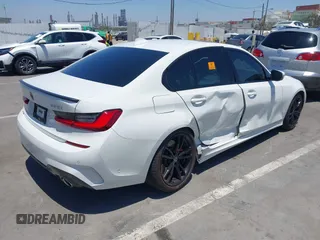 2019 BMW 3 Series 330i with VIN WBA5R1C55KAJ98934, listed as a IAAI auction lot 42396379 with 65,946 mi miles and . Bid and sale history available at DreamBid. Image 4.