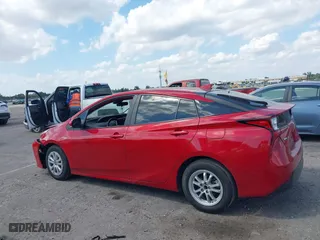 2021 Toyota Prius L Eco with VIN JTDKAMFU6M3148195, listed as a IAAI auction lot 41801369 with 130,601 mi miles. Bid and sale history available at carsss.com. Image 15.