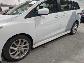 2012 Mazda Mazda5 Grand Touring with VIN JM1CW2DL9C0100114, listed as a IAAI auction lot 42038998 with 160,651 mi miles. Bid and sale history available at carsss.com. Image 12.