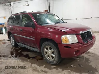 2006 GMC Envoy SLT with VIN 1GKDS13S362135683, listed as a IAAI auction lot 41477501 with 214,760 mi miles. Bid and sale history available at carsss.com. Image 1.