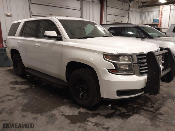 2020 Chevrolet Tahoe Commercial with VIN 1GNSKDECXLR260202, listed as a IAAI auction lot 41608712 with 137,214 mi miles. Bid and sale history available at carsss.com. Image 1.