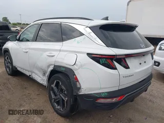 2023 Hyundai Tucson SEL Convenience z VIN KM8JFCA14PU123858, wystawiony jako IAAI lot #42464664 z przebiegiem 38 672 mil mil oraz . Historia ofert i sprzedaży dostępna na DreamBid. Obrazek 3.