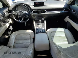 2018 Mazda CX-5 Grand Touring с VIN JM3KFBDM8J0344328, выставлен на аукционе Copart как лот 57665175 с пробегом 131 175 миль миль и Списание • Salvage title. История ставок и продаж доступна на DreamBid. Изображение 8.