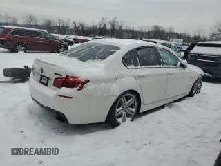 2015 BMW 5 Series 550i with VIN WBAKN9C55FD960970, listed as a Copart auction lot 84994434 with 105,593 mi miles and Salvage title. Bid and sale history available at DreamBid. Image 3.