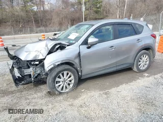 2013 Mazda CX-5 Touring with VIN JM3KE2CE9D0133348, listed as a IAAI auction lot 41357592 with 122,227 mi miles. Bid and sale history available at carsss.com. Image 17.