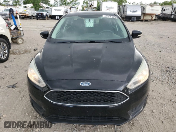 2017 Ford Focus SE z VIN 1FADP3F29HL291329, wystawiony jako Copart lot #58964155 z przebiegiem 102 506 mil mil oraz Czysty tytuł • Clean title. Historia ofert i sprzedaży dostępna na DreamBid. Obrazek 5.