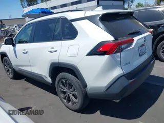 2023 Toyota RAV4 Hybrid XLE Premium with VIN JTMB6RFV0PD087237, listed as a IAAI auction lot 42606802 with 16,872 mi miles and . Bid and sale history available at DreamBid. Image 3.