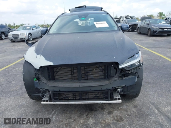 2022 Volvo XC60 Momentum z VIN YV4L12RKXN1052826, wystawiony jako IAAI lot #41869228 z przebiegiem 30 044 mil mil oraz . Historia ofert i sprzedaży dostępna na DreamBid. Obrazek 6.