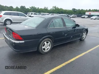 2001 Lincoln LS w/Base Pkg z VIN 1LNHM87A11Y601193, wystawiony jako IAAI lot #42341770 z przebiegiem 187 845 mil mil oraz . Historia ofert i sprzedaży dostępna na DreamBid. Obrazek 4.