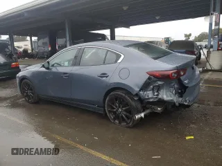 2025 Mazda 3 S Carbon Edition with VIN JM1BPBCM3S1767854, listed as a Copart auction lot 43643335 with 1,065 mi miles and Salvage Title. Bid and sale history available at DreamBid. Image 2.