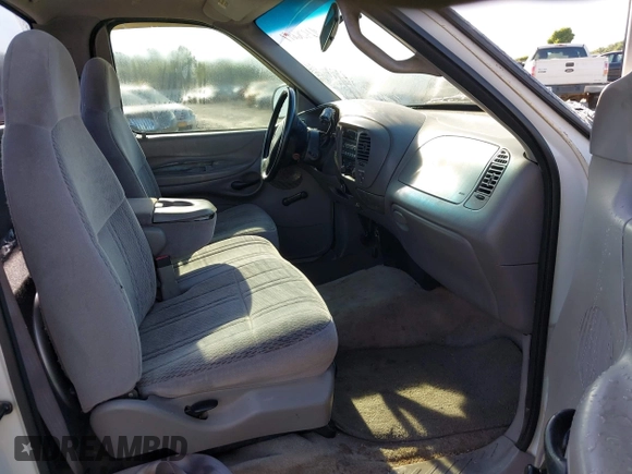 1997 Ford F-150 z VIN 1FTDF1764VNC68673, wystawiony jako IAAI lot #42306694 z przebiegiem 152 595 mil mil oraz . Historia ofert i sprzedaży dostępna na DreamBid. Obrazek 5.