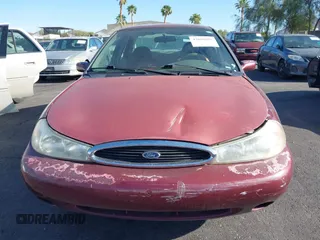 1999 Ford Contour z VIN 1FAFP6538XK117065, wystawiony jako IAAI lot #42088857 z przebiegiem 138 489 mil mil oraz . Historia ofert i sprzedaży dostępna na DreamBid. Obrazek 6.