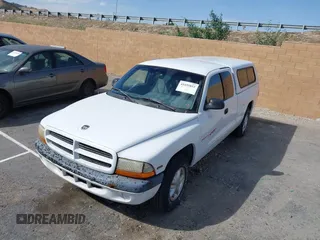 1999 Dodge Dakota with VIN 1B7FL22P0XS288012, listed as a IAAI auction lot 41695852 with 150,431 mi miles. Bid and sale history available at carsss.com. Image 6.