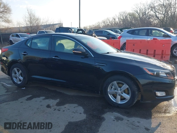 2015 Kia Optima LX with VIN 5XXGM4A70FG371690, listed as a IAAI auction lot 41884415 with 139,601 mi miles and . Bid and sale history available at DreamBid. Image 14.
