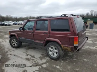 2000 Jeep Cherokee z VIN 1J4FF48S0YL254270, wystawiony jako Copart lot #52589415 z przebiegiem 166 860 mil mil oraz Szkoda całkowita • Salvage title. Historia ofert i sprzedaży dostępna na DreamBid. Obrazek 2.