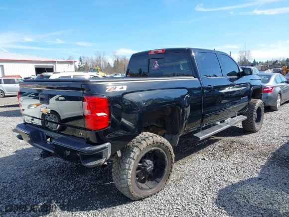 2016 Chevrolet Silverado 1500 LT with VIN 3GCUKREC0GG306088, listed as a IAAI auction lot 41870097 with 203,563 mi miles. Bid and sale history available at carsss.com. Image 4.