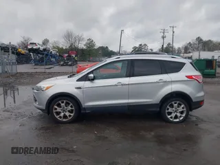 2016 Ford Escape Titanium with VIN 1FMCU0JX7GUB25573, listed as a IAAI auction lot 41871980 with 157,525 mi miles. Bid and sale history available at carsss.com. Image 14.