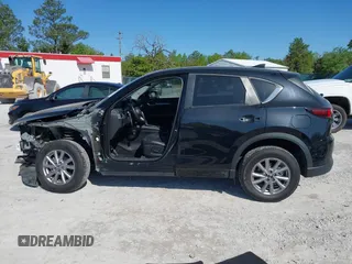 2023 Mazda CX-5 S Preferred with VIN JM3KFBCM7P0188244, listed as a IAAI auction lot 41969630 with 51,058 mi miles and . Bid and sale history available at carsss.com. Image 15.