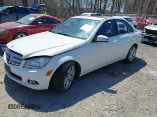 2011 Mercedes-Benz C with VIN WDDGF8BBXBR174317, listed as a IAAI auction lot 42116532 with 121,227 mi miles. Bid and sale history available at carsss.com. Image 2.