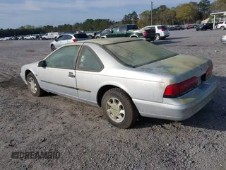1995 Ford Thunderbird LX with VIN 1FALP62WXSH147871, listed as a IAAI auction lot 41878652 with 95,305 mi miles. Bid and sale history available at carsss.com. Image 3.