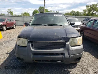 2003 Ford Escape XLT Popular 2 with VIN 1FMYU93133KB35168, listed as a Copart auction lot 57303335 with 197,368 mi miles and Salvage title. Bid and sale history available at DreamBid. Image 5.