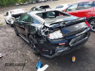 2020 Ford Mustang EcoBoost with VIN 1FA6P8TH4L5161843, listed as a IAAI auction lot 42242171 with 45,892 mi miles and . Bid and sale history available at DreamBid. Image 3.