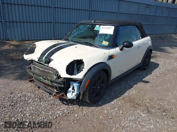 2013 MINI Convertible with VIN WMWZN3C58DT135598, listed as a IAAI auction lot 42122817 with 120,638 mi miles and . Bid and sale history available at DreamBid. Image 2.