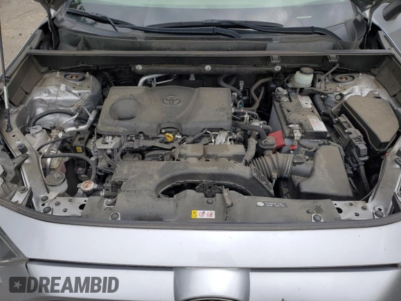 2019 Toyota RAV4 LE with VIN JTMG1RFV4KD004180, listed as a Copart auction lot 57127095 with 71,454 mi miles and Salvage title. Bid and sale history available at DreamBid. Image 12.